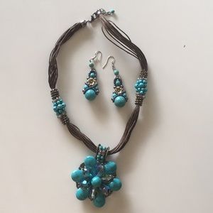 A set of necklace and earrings